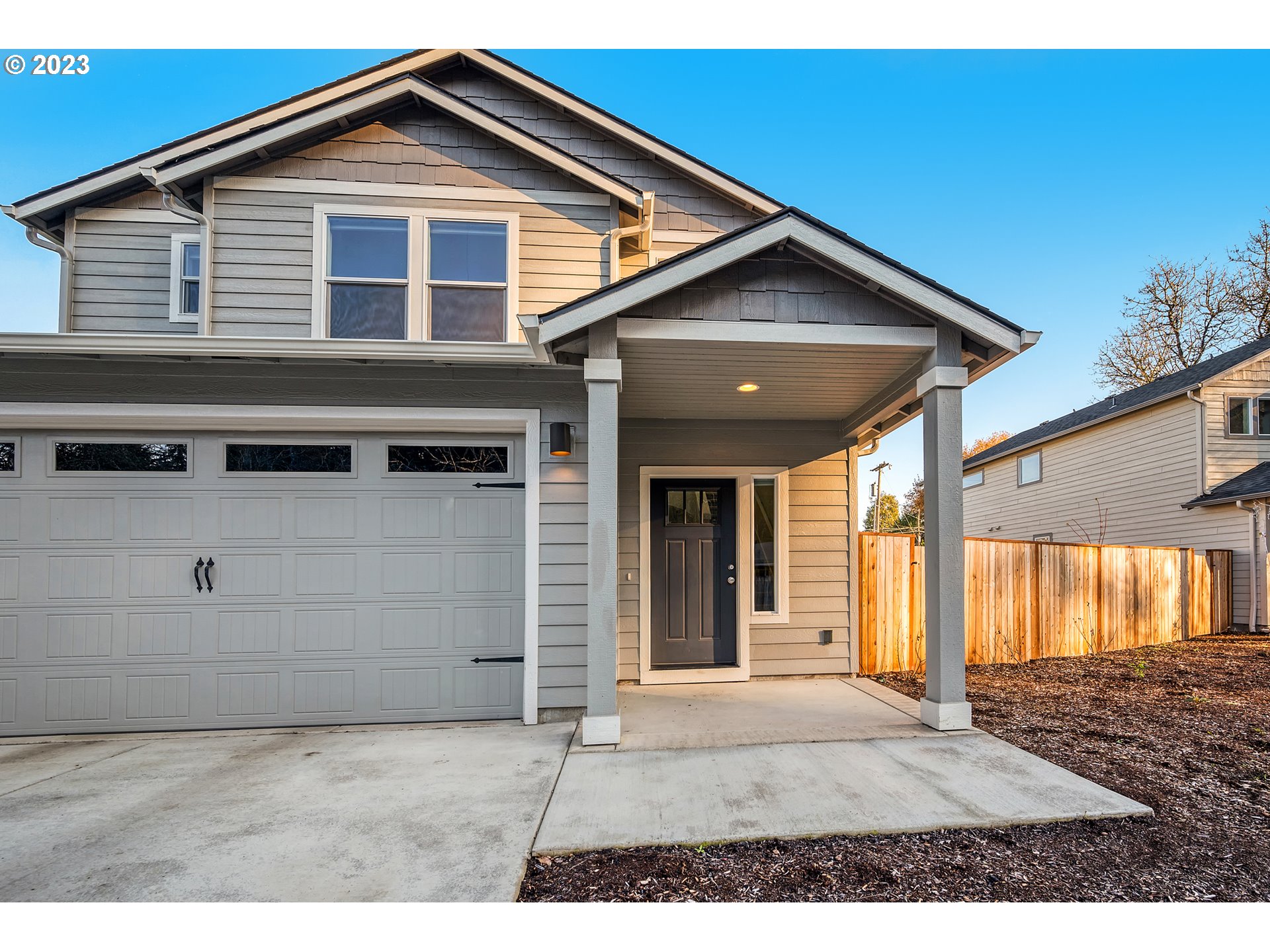 1057 Laura Street Springfield, OR 97477 - Photo 2 of 39 a front view of a house with a yard