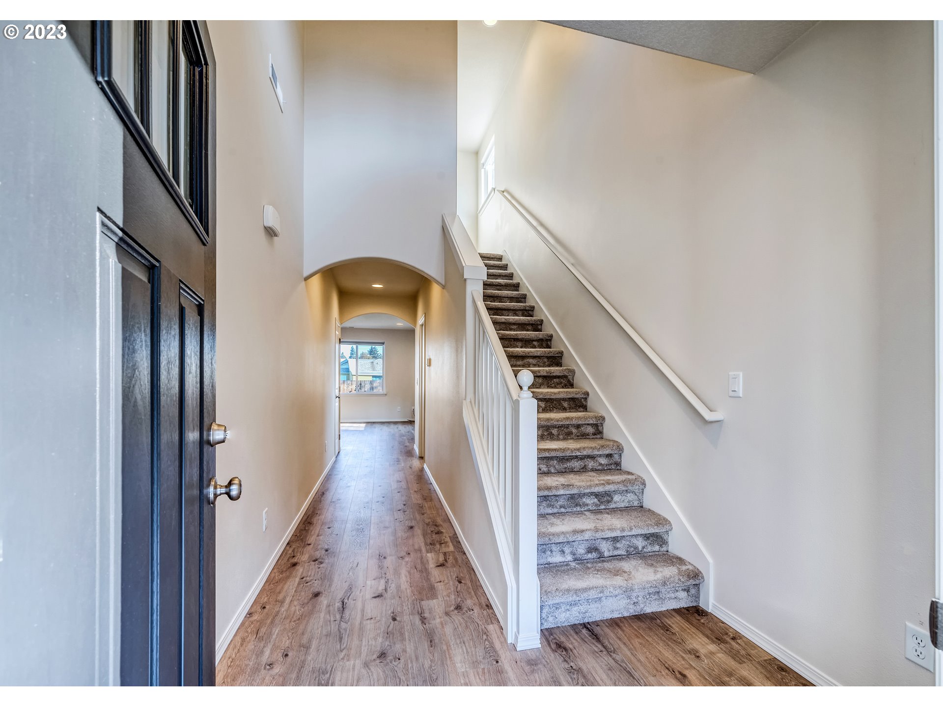 1057 Laura Street Springfield, OR 97477 - Photo 3 of 39 a view of entryway with wooden floor