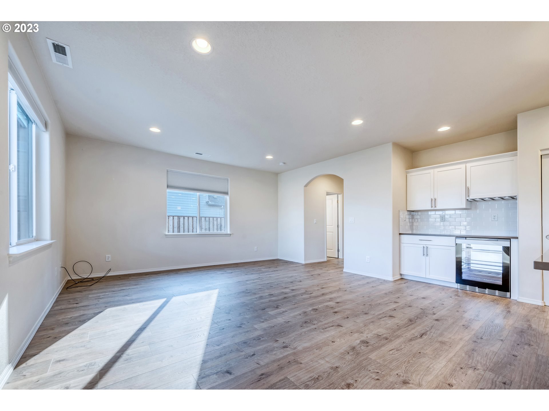 1057 Laura Street Springfield, OR 97477 - Photo 6 of 39 a view of kitchen with cabinets and wooden floor