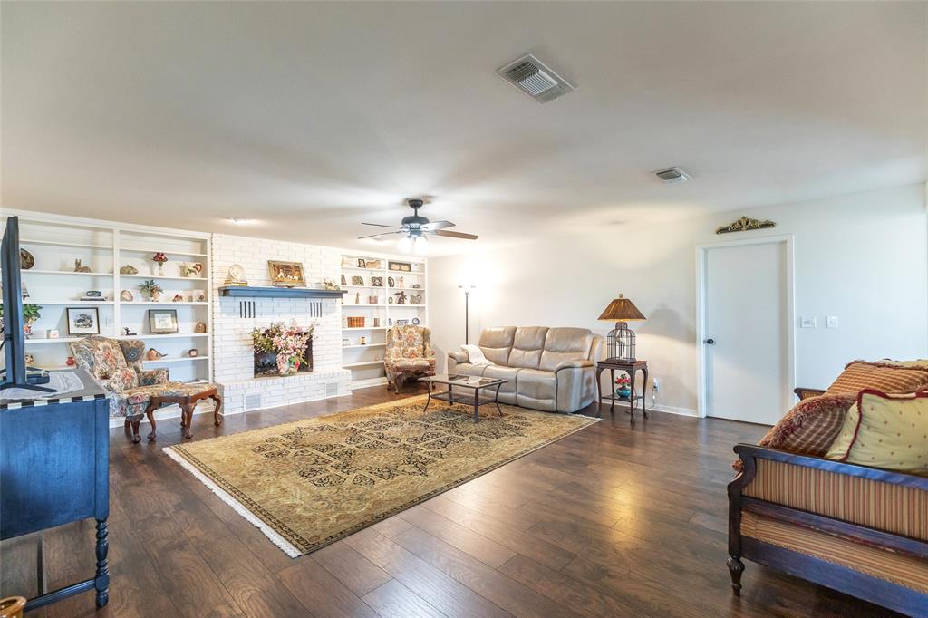 642 Fm 3200 Comanche, TX 76442 - Photo 12 of 37 a living room with furniture and wooden floor