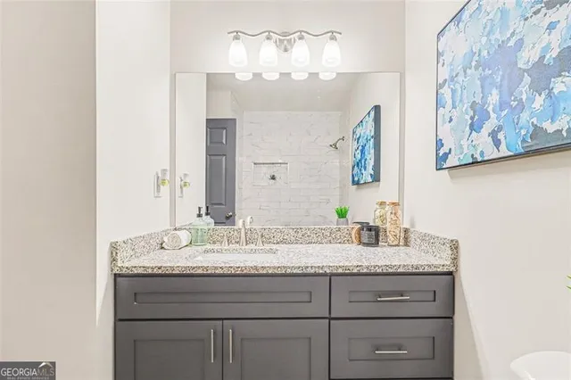 a bathroom with a toilet and a bathtub