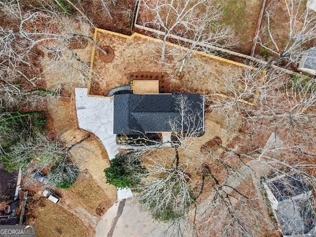 a house with trees in front of it