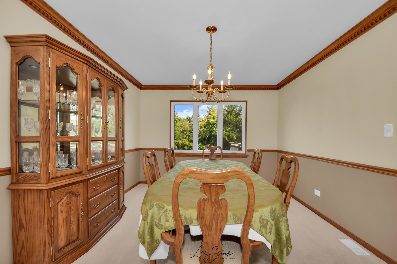 19407 Cherry Street Mokena, IL 60448 - Photo 13 of 33 a view of a dining room with furniture large window and chandelier