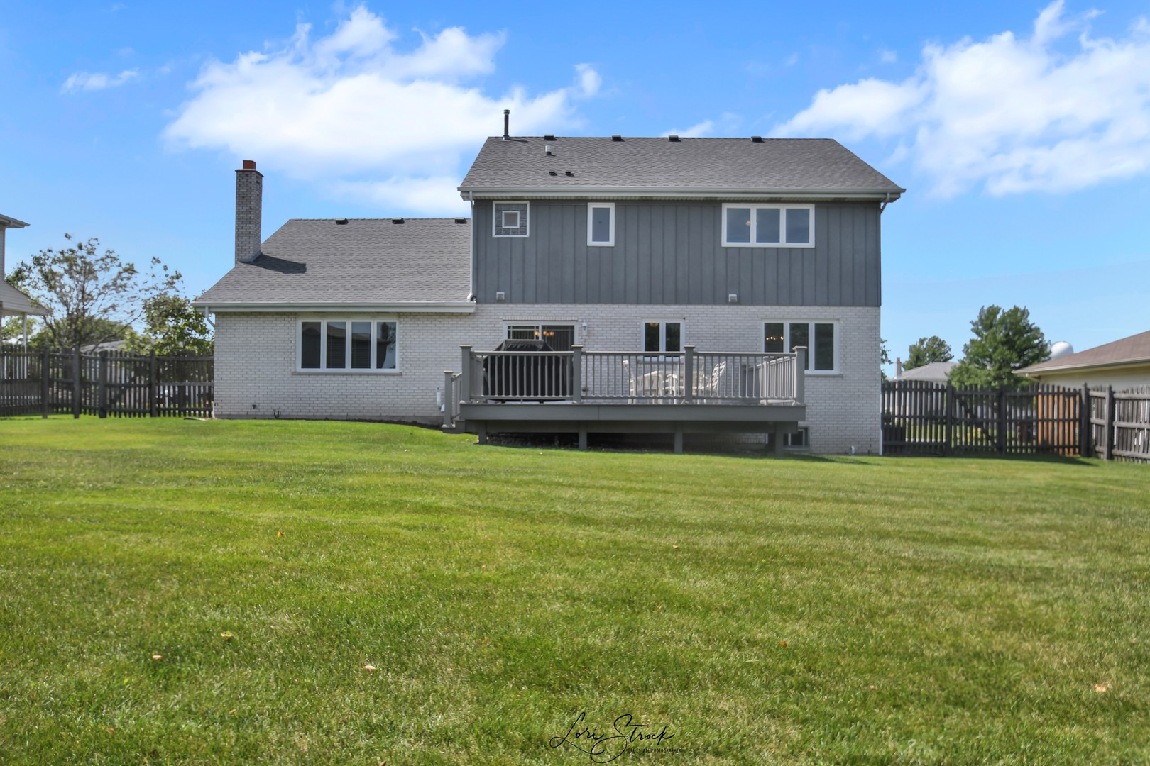 19407 Cherry Street Mokena, IL 60448 - Photo 5 of 33 a front view of a house with a garden