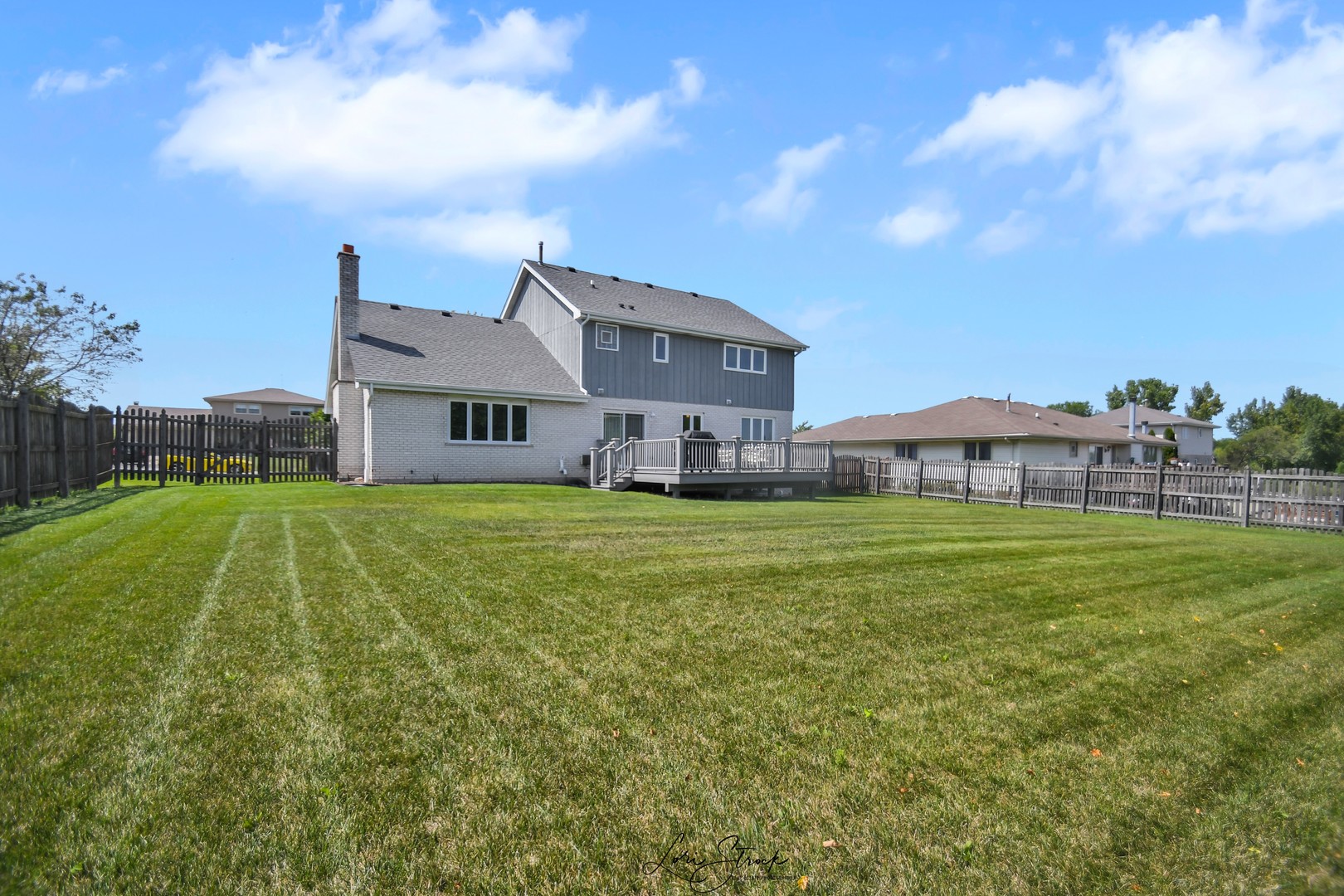 19407 Cherry Street Mokena, IL 60448 - Photo 6 of 33 a house view with a garden space