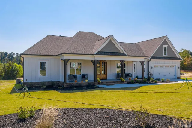 a front view of a house with swimming pool