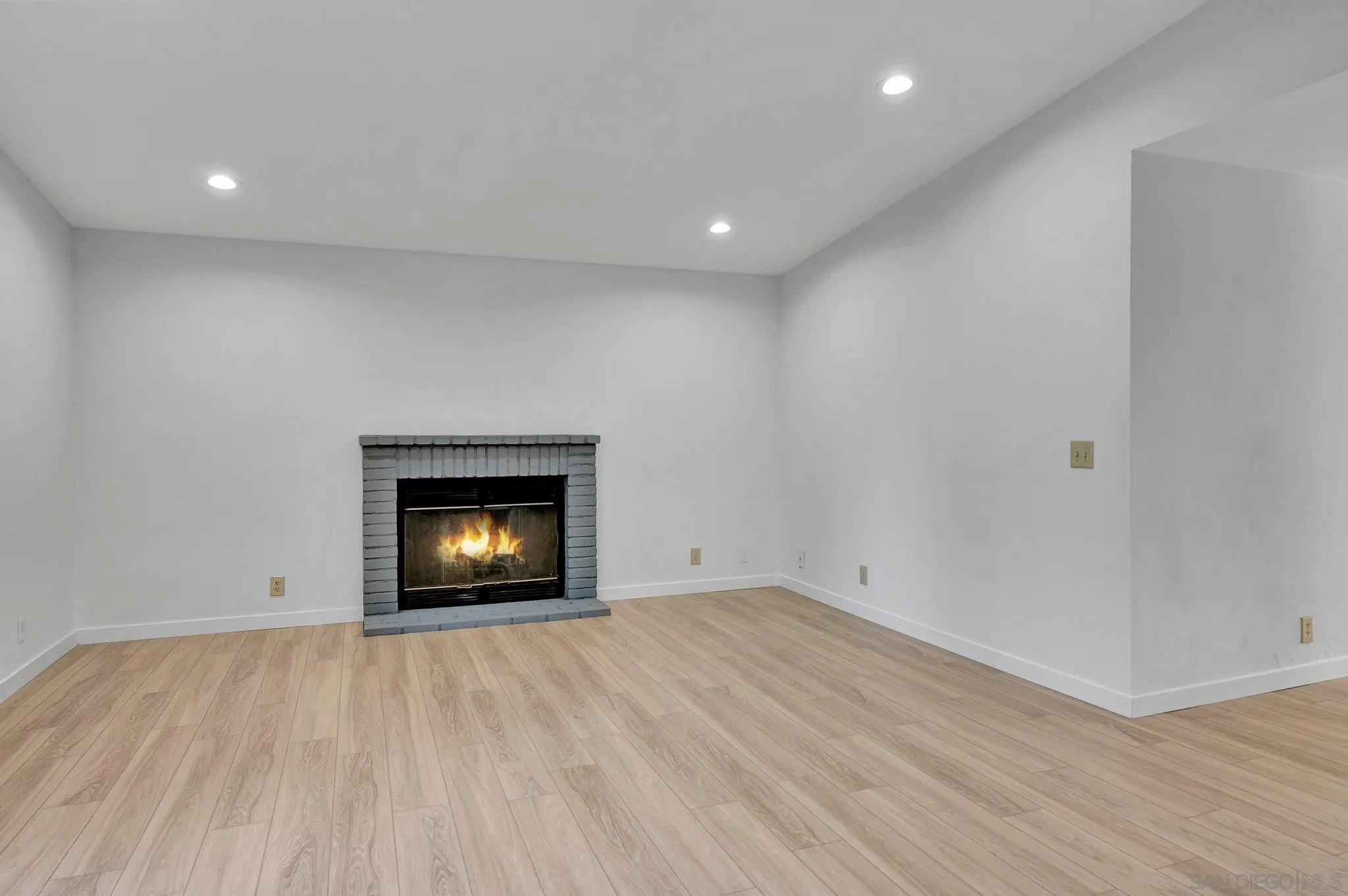 13455 Olive Tree Lane Poway, CA 92064 - Photo 13 of 36 a view of an empty room and wooden floor