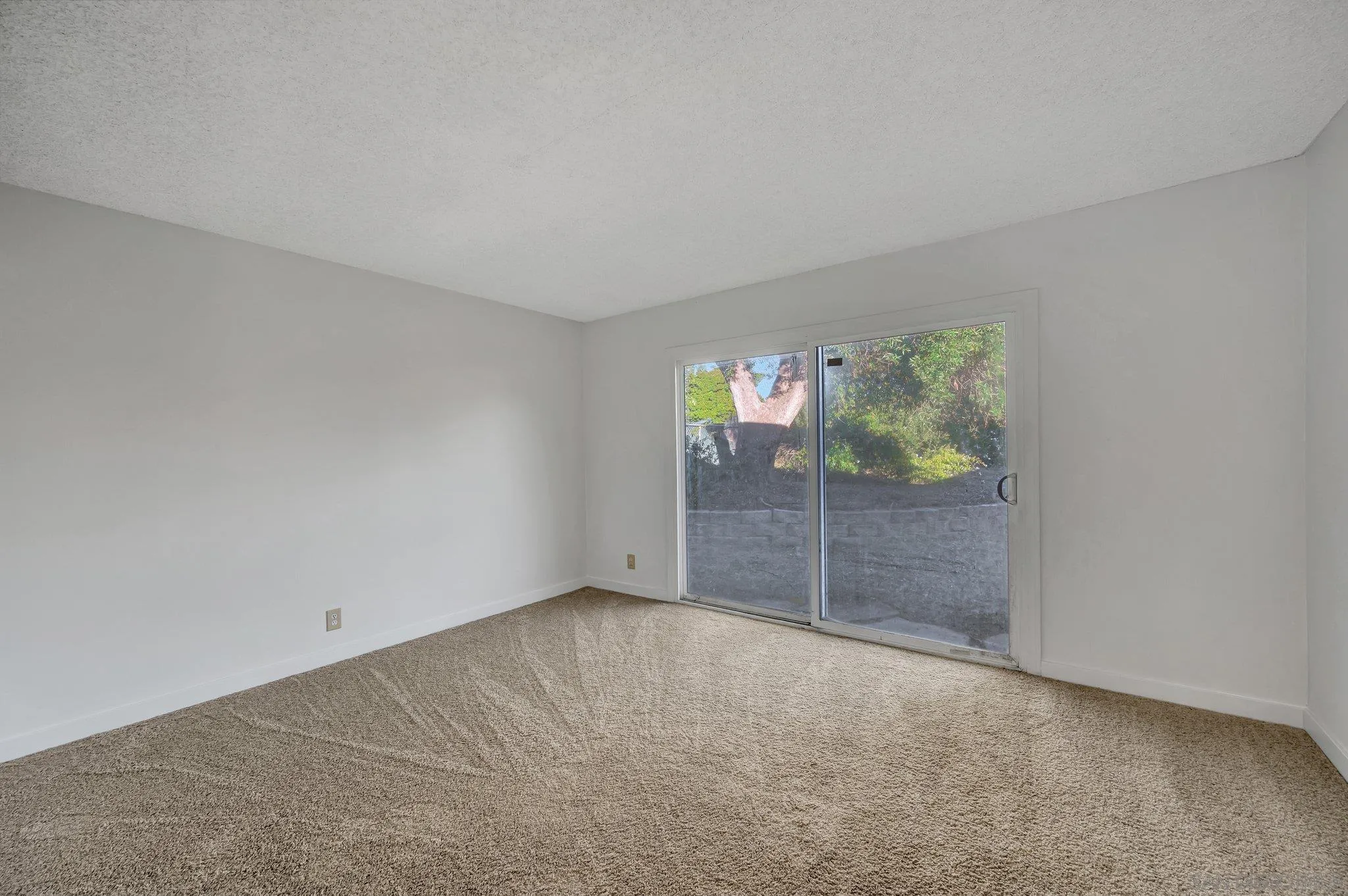 13455 Olive Tree Lane Poway, CA 92064 - Photo 15 of 36 an empty room with windows