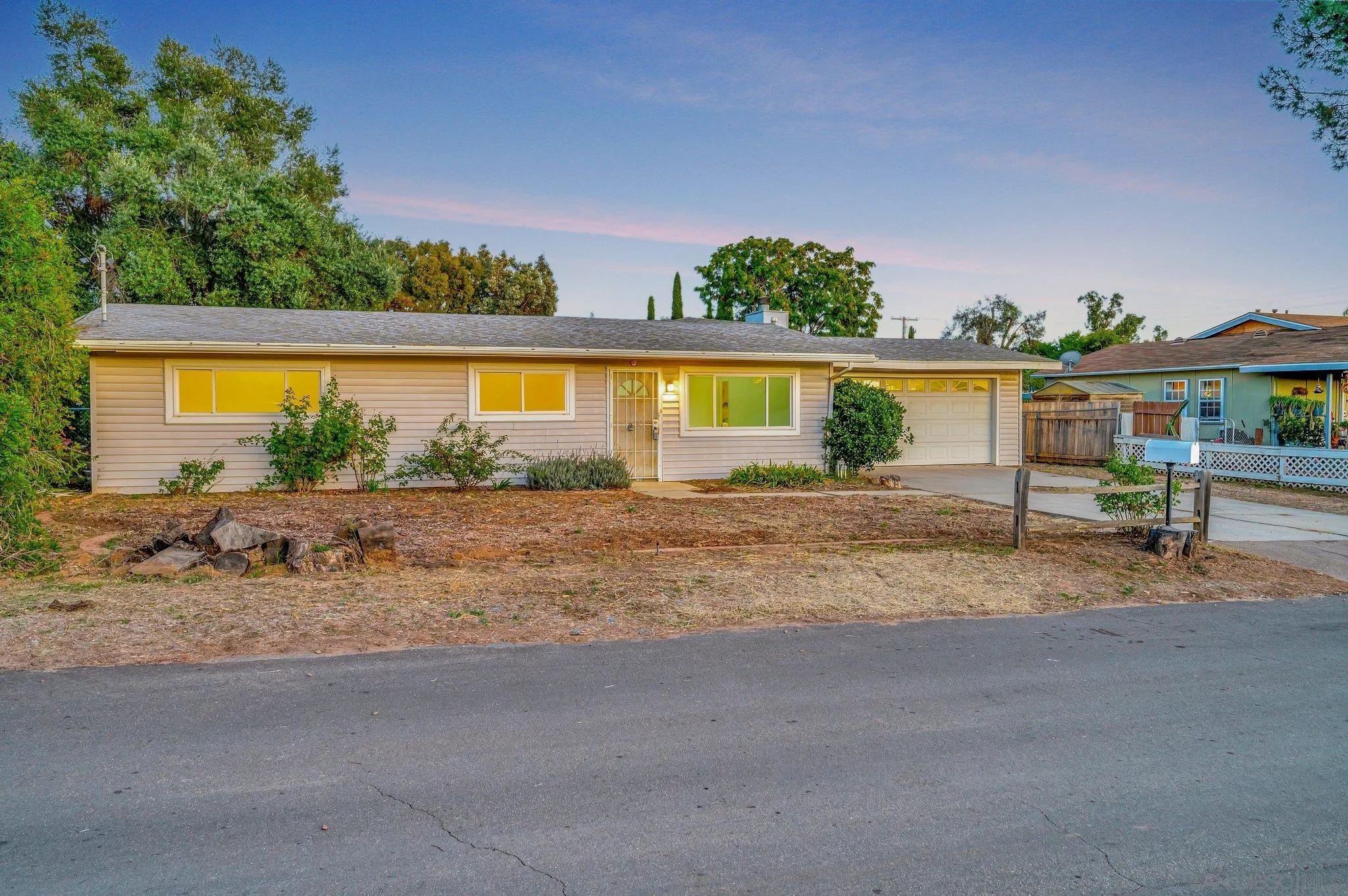 13455 Olive Tree Lane Poway, CA 92064 - Photo 2 of 36 front view of house with a yard