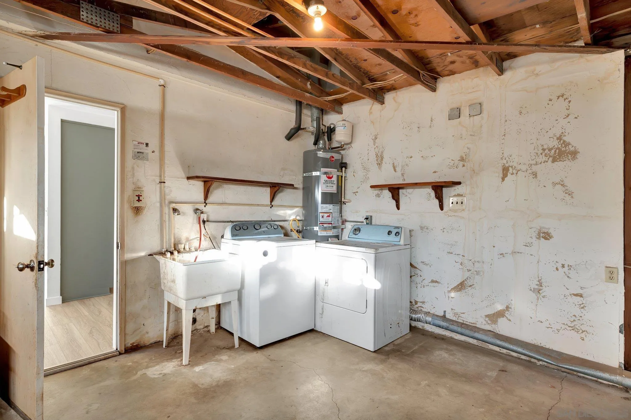 13455 Olive Tree Lane Poway, CA 92064 - Photo 23 of 36 a large white bed sitting in a kitchen