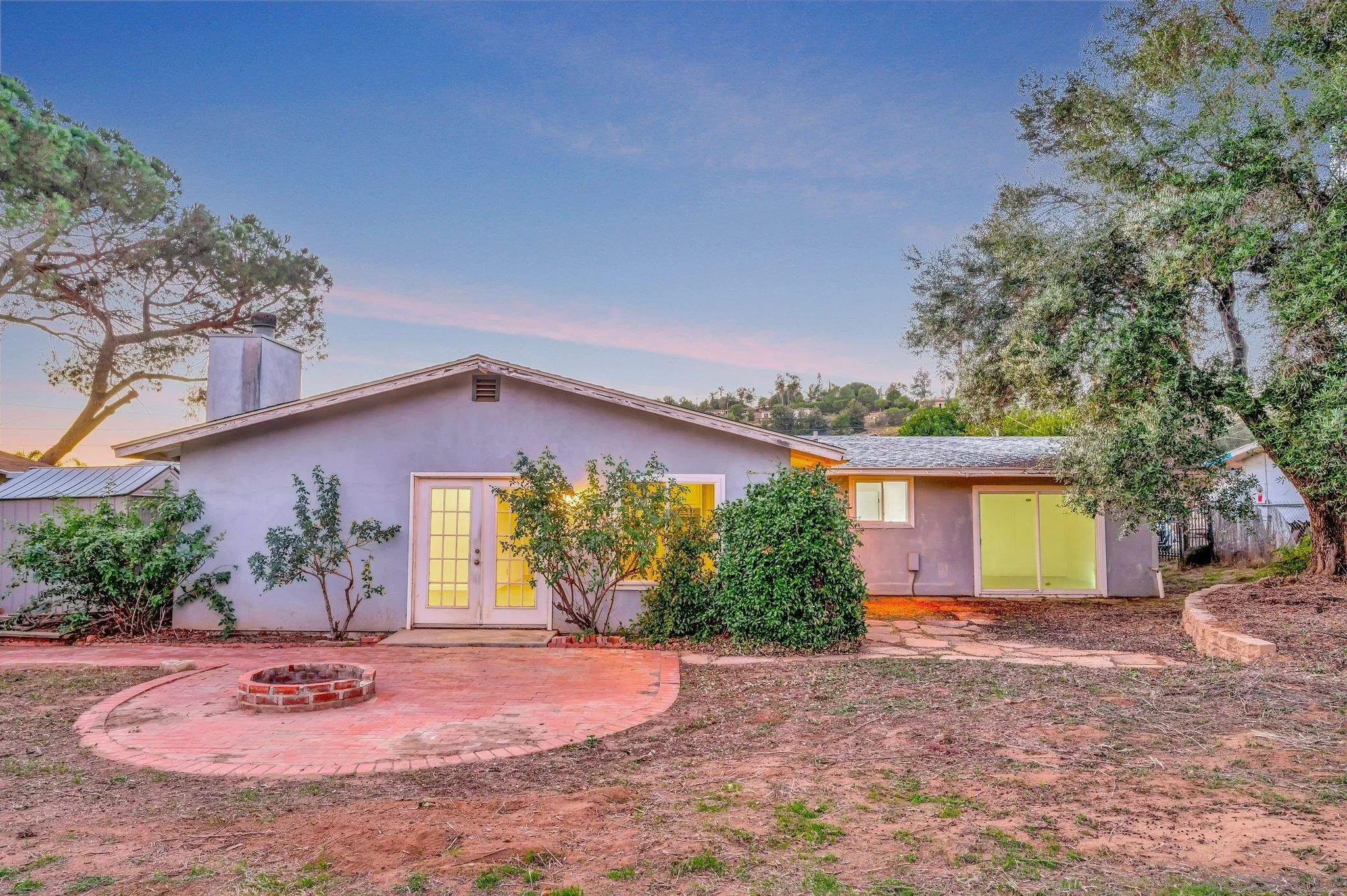 13455 Olive Tree Lane Poway, CA 92064 - Photo 25 of 36 a front view of a house with garden