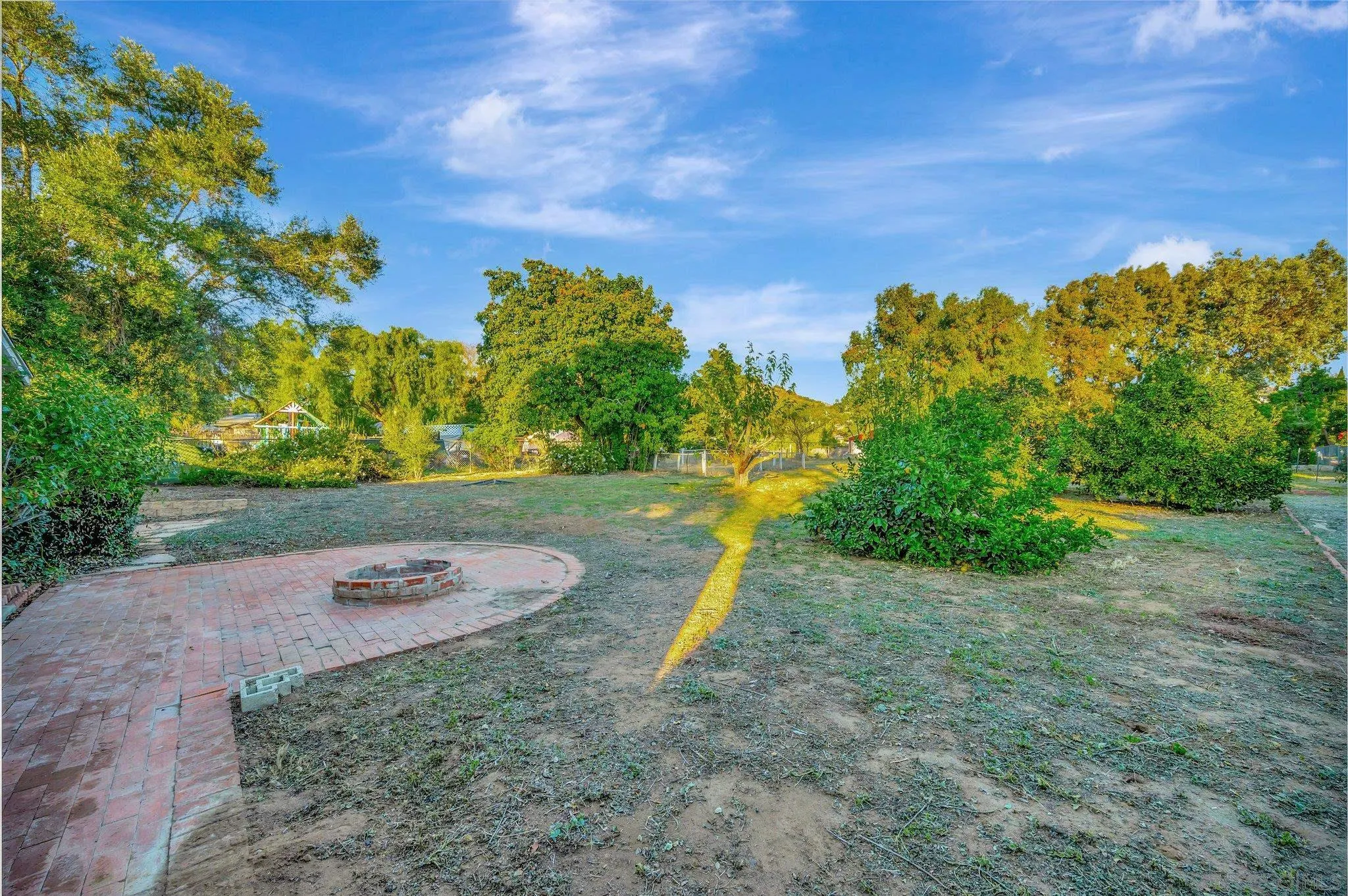 13455 Olive Tree Lane Poway, CA 92064 - Photo 28 of 36 a view of a garden with an outdoor space
