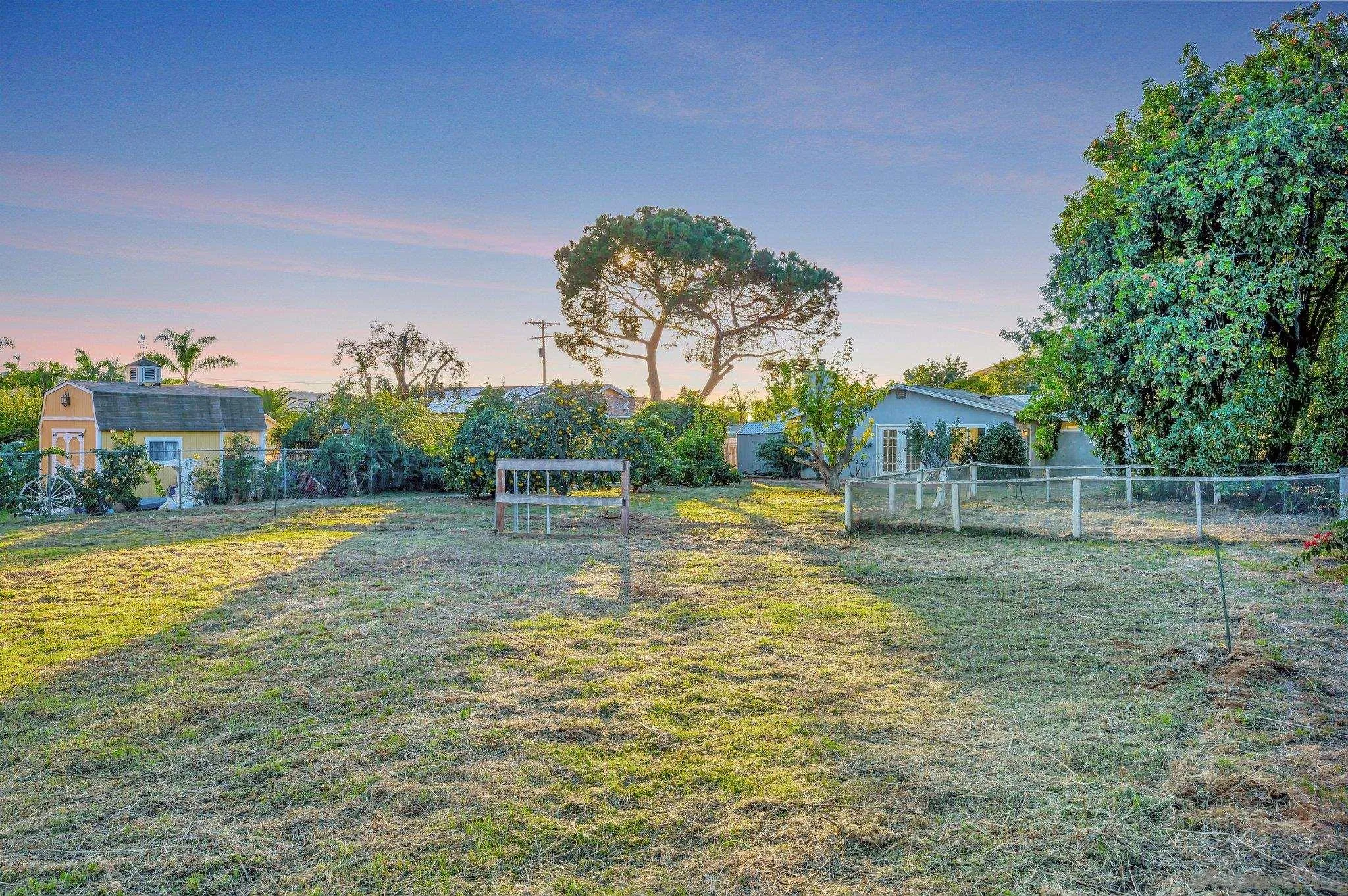 13455 Olive Tree Lane Poway, CA 92064 - Photo 32 of 36 a view of a swimming pool with a yard
