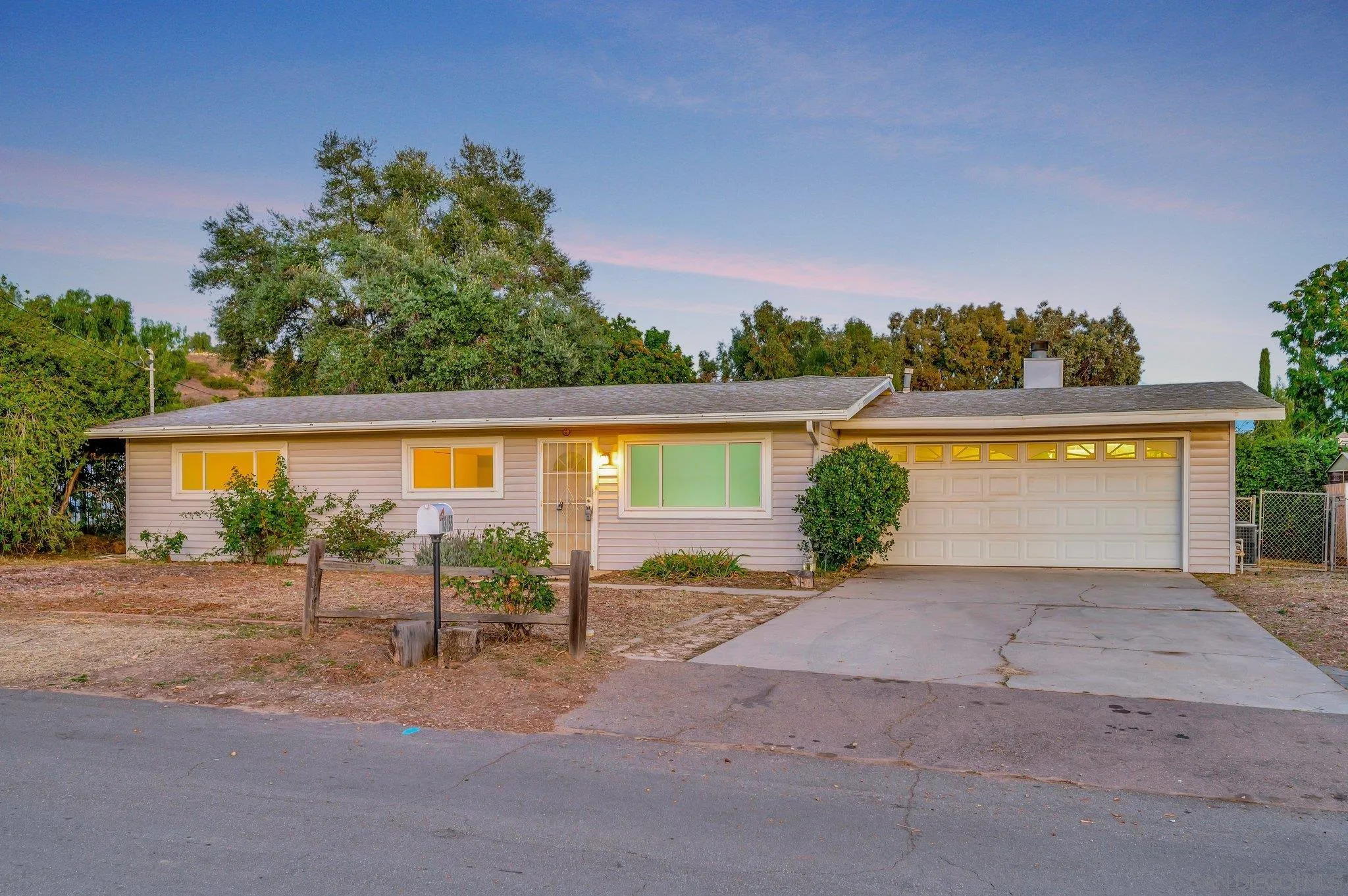 13455 Olive Tree Lane Poway, CA 92064 - Photo 36 of 36 front view of house with a yard and potted plants