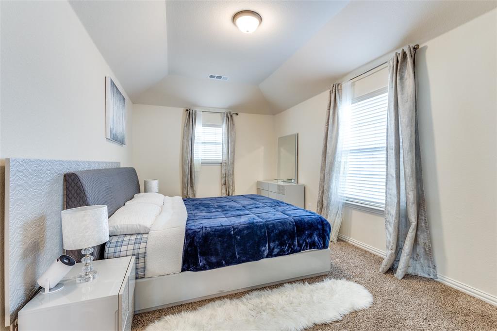 1324 Needle Cactus Drive Fort Worth, TX 76177 - Photo 26 of 36 a bedroom with a bed and window
