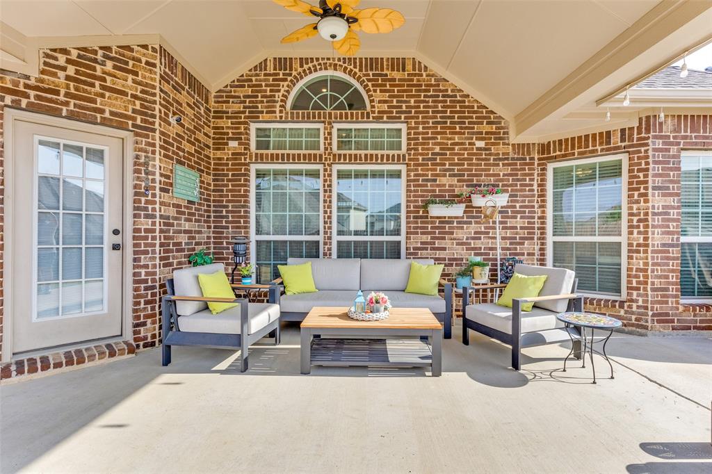 1324 Needle Cactus Drive Fort Worth, TX 76177 - Photo 33 of 36 a outdoor space with patio the couches and a dining table with garden view