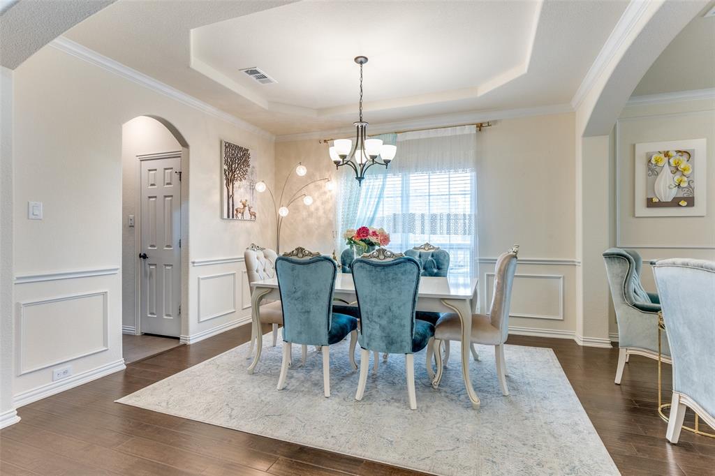 1324 Needle Cactus Drive Fort Worth, TX 76177 - Photo 6 of 36 a view of a dining room with furniture window and wooden floor