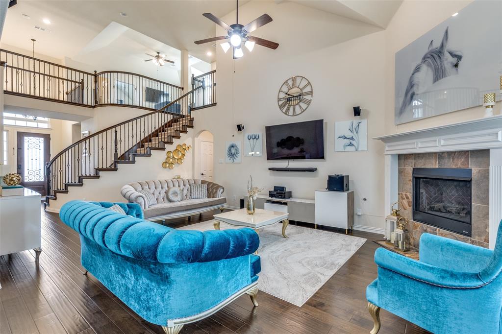 1324 Needle Cactus Drive Fort Worth, TX 76177 - Photo 10 of 36 a living room with furniture and a fireplace