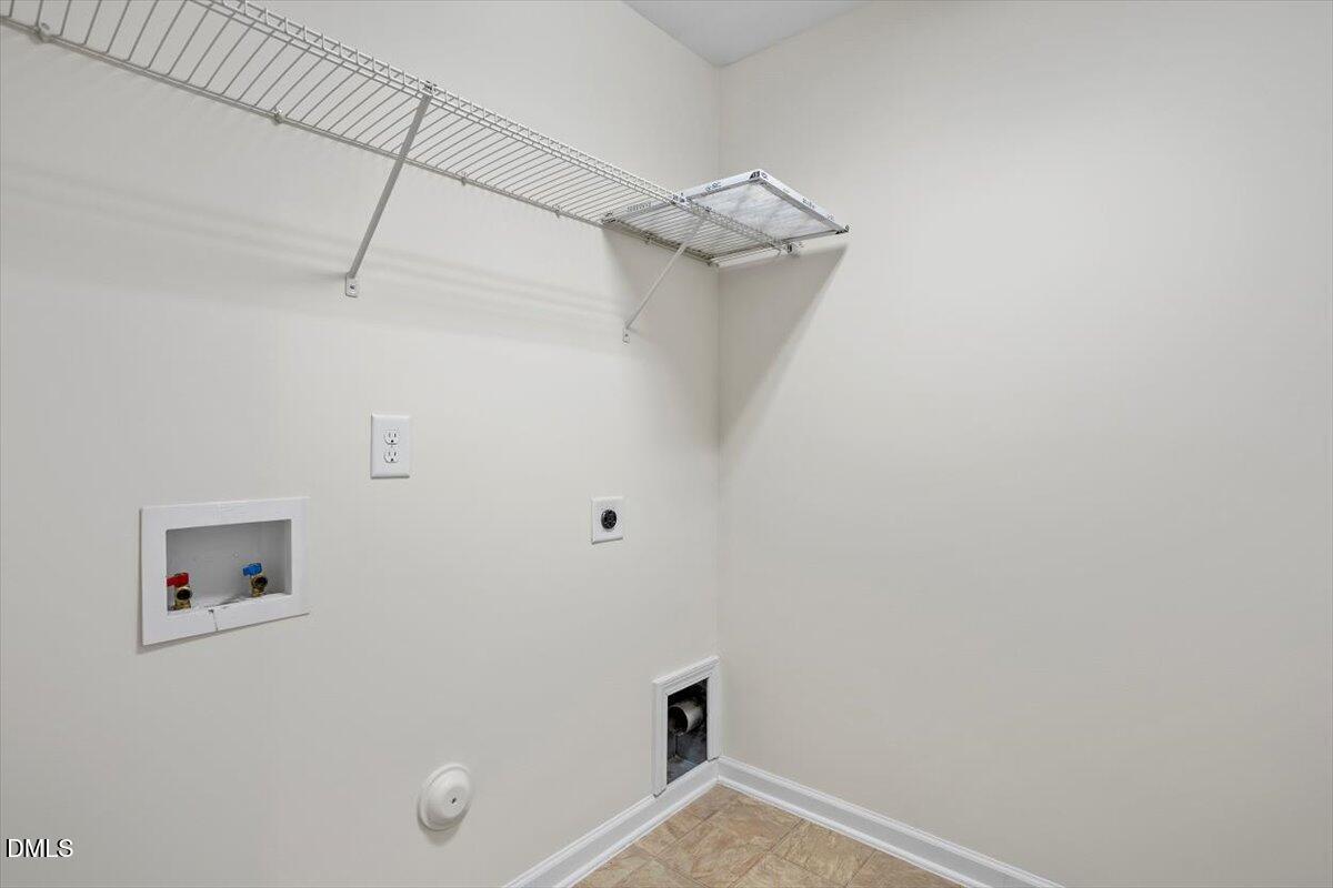 2306 Stoney Spring Drive Raleigh, NC 27610 - Photo 25 of 36 2nd floor laundry