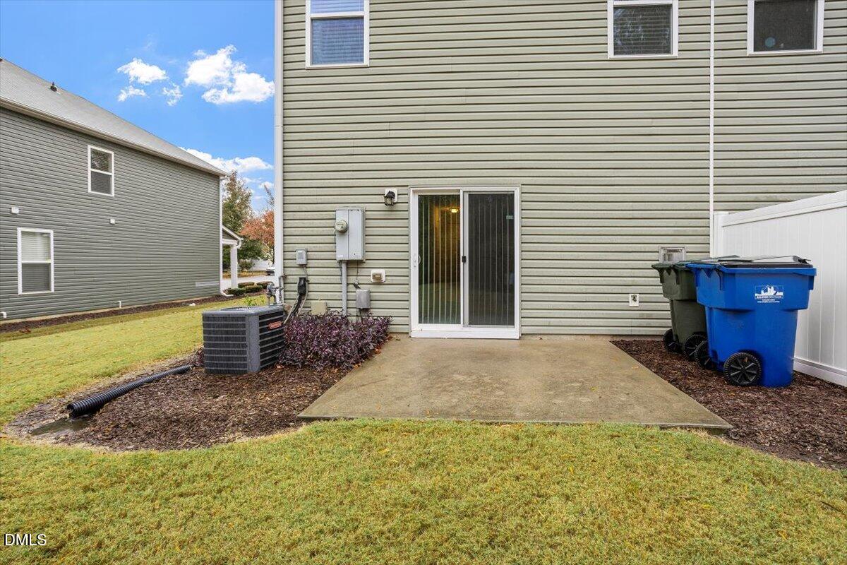 2306 Stoney Spring Drive Raleigh, NC 27610 - Photo 29 of 36 a view of a house with backyard and porch