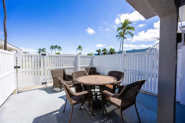 a view of a table and chairs in patio