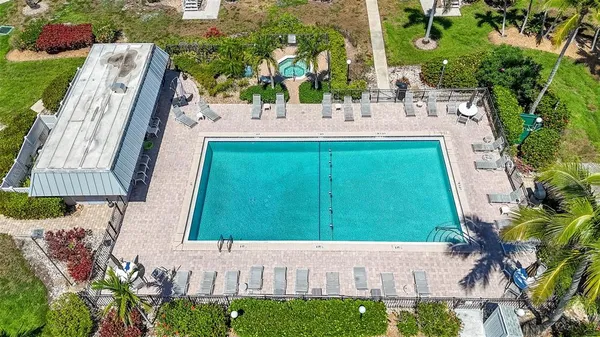 a view of a house with a sink and garden in the background