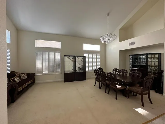 a living room with furniture and window