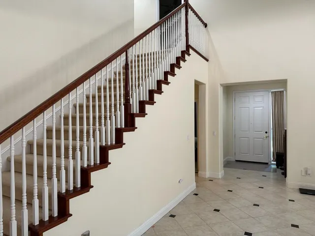 a view of entryway with stairs