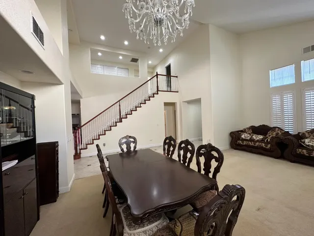 a view of a dining room with furniture