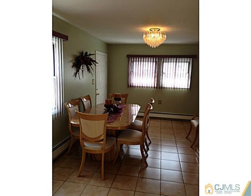 171 Winthrop Road Edison, NJ 08817 - Photo 4 of 13 a dining room with furniture and window