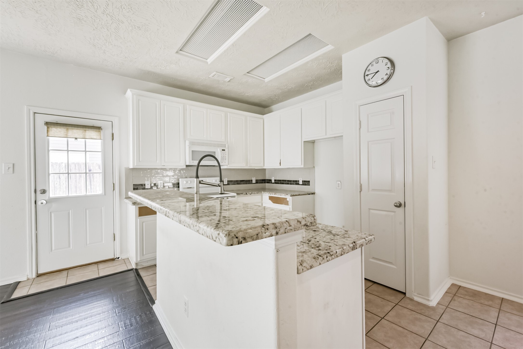 17538 Olympic Park Lane Humble, TX 77346 - Photo 8 of 21 Granite Counters. Cabinets have been repaired!