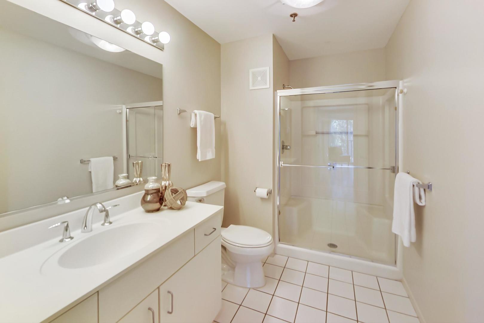 351 Kelburn Road, Unit 213 Deerfield, IL 60015 - Photo 21 of 37 a bathroom with a sink a toilet and shower