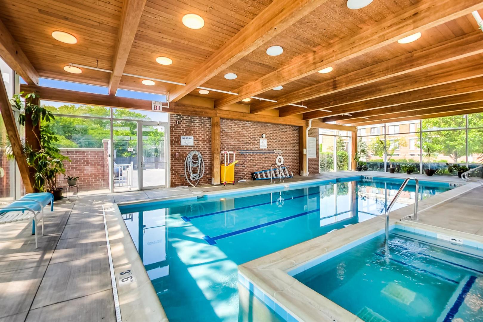 351 Kelburn Road, Unit 213 Deerfield, IL 60015 - Photo 33 of 37 a view of a swimming pool with a patio