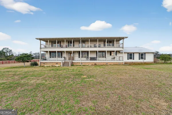a house view with a garden space