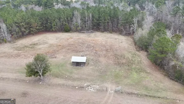 a terrace with a table and chairs