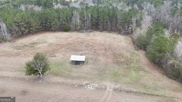 a terrace with a table and chairs