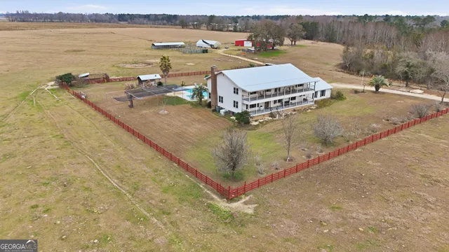 a view of a hallway with a lots of frames and toys