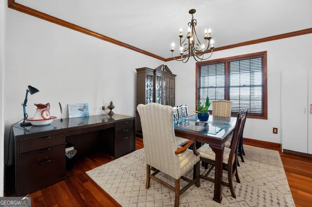 a large kitchen with stainless steel appliances microwave stove refrigerator and cabinets