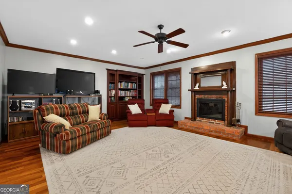 a bed room with a bed window and a chair