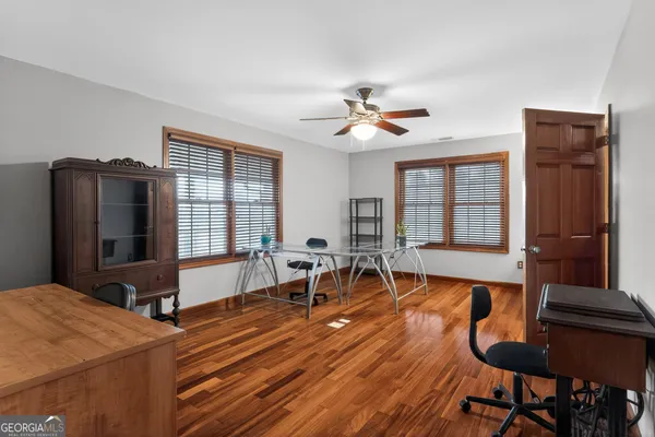 a living room with a rug