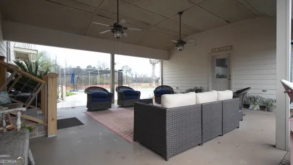 a view of a swimming pool and a yard