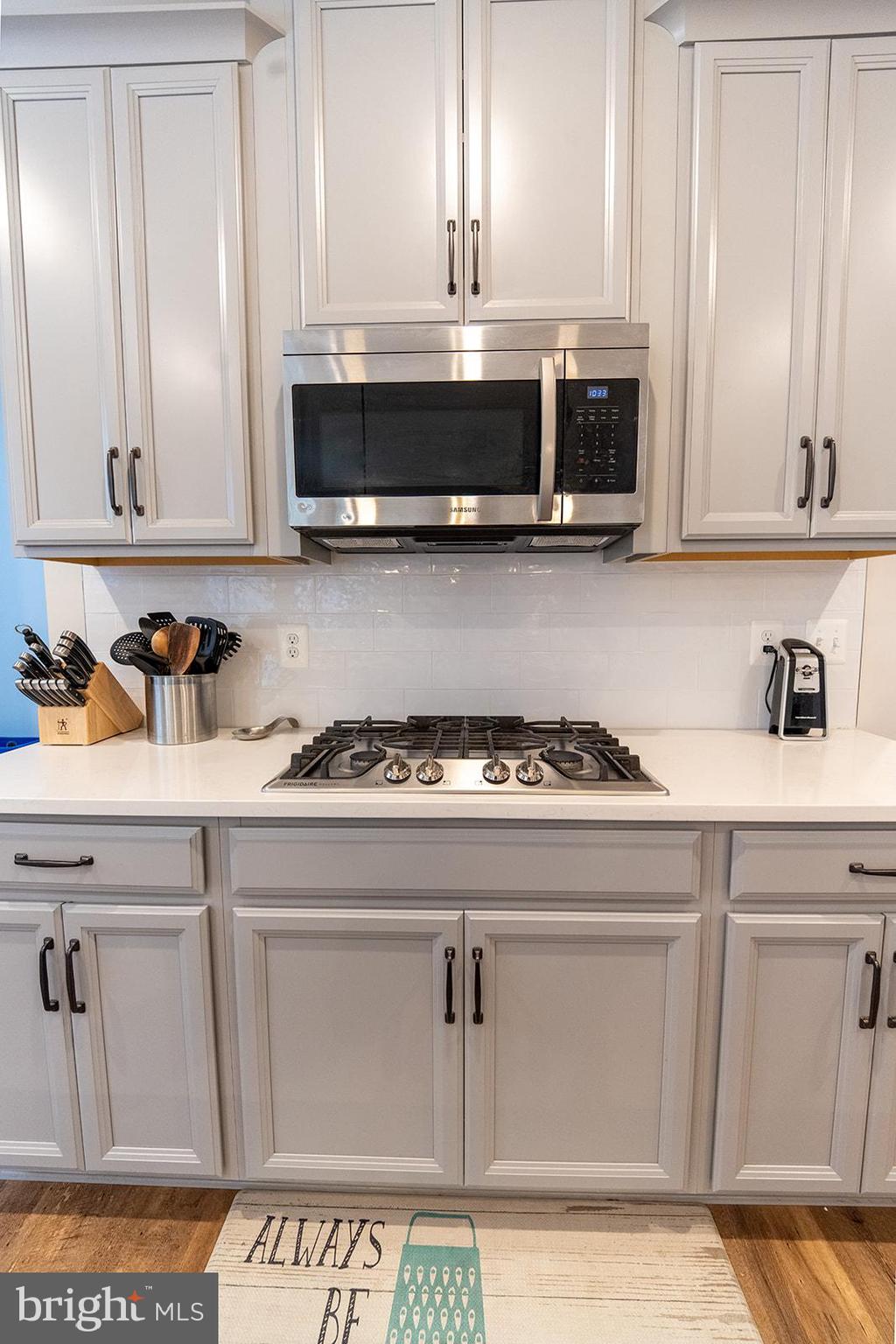 43907 Monterey Street California, MD 20619 - Photo 29 of 95 a stove top oven sitting inside of a kitchen