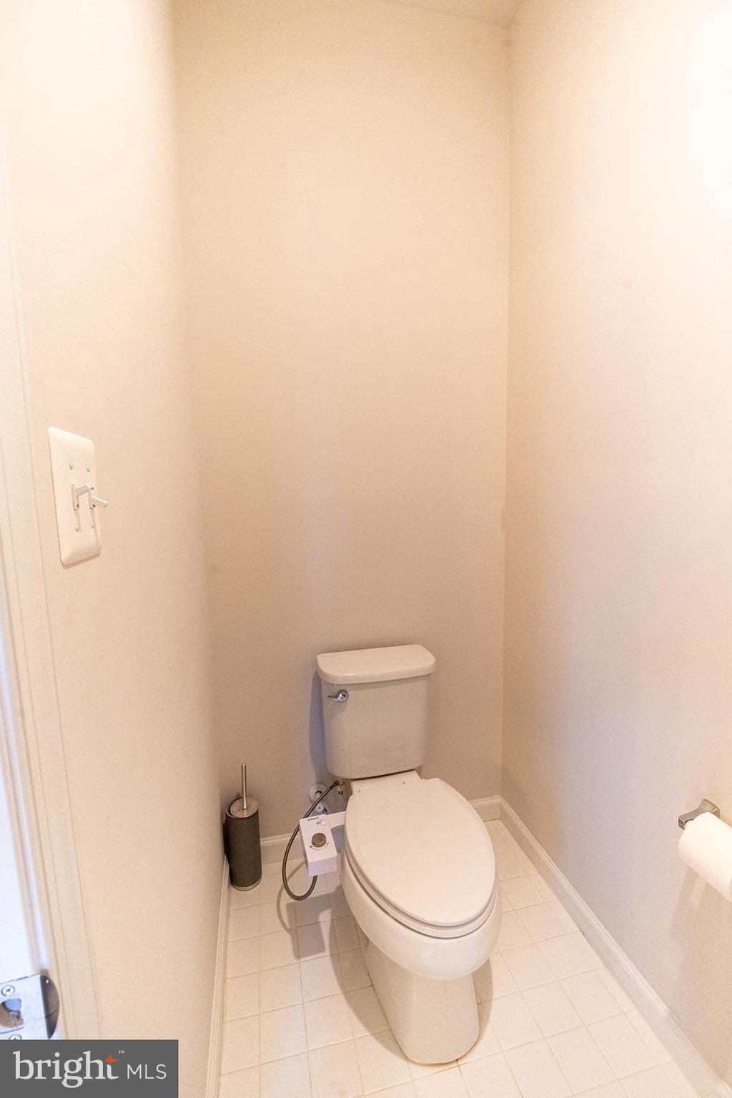 43907 Monterey Street California, MD 20619 - Photo 59 of 95 a white toilet sitting next to a white wall