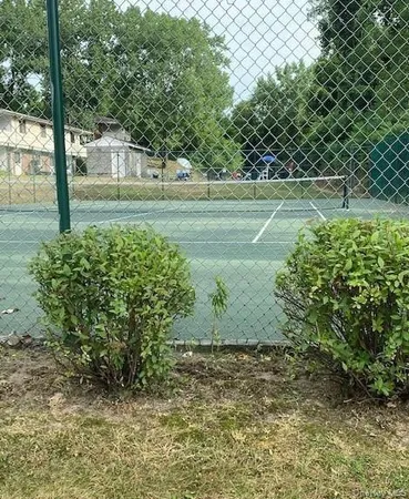 a view of a yard with an outdoor space