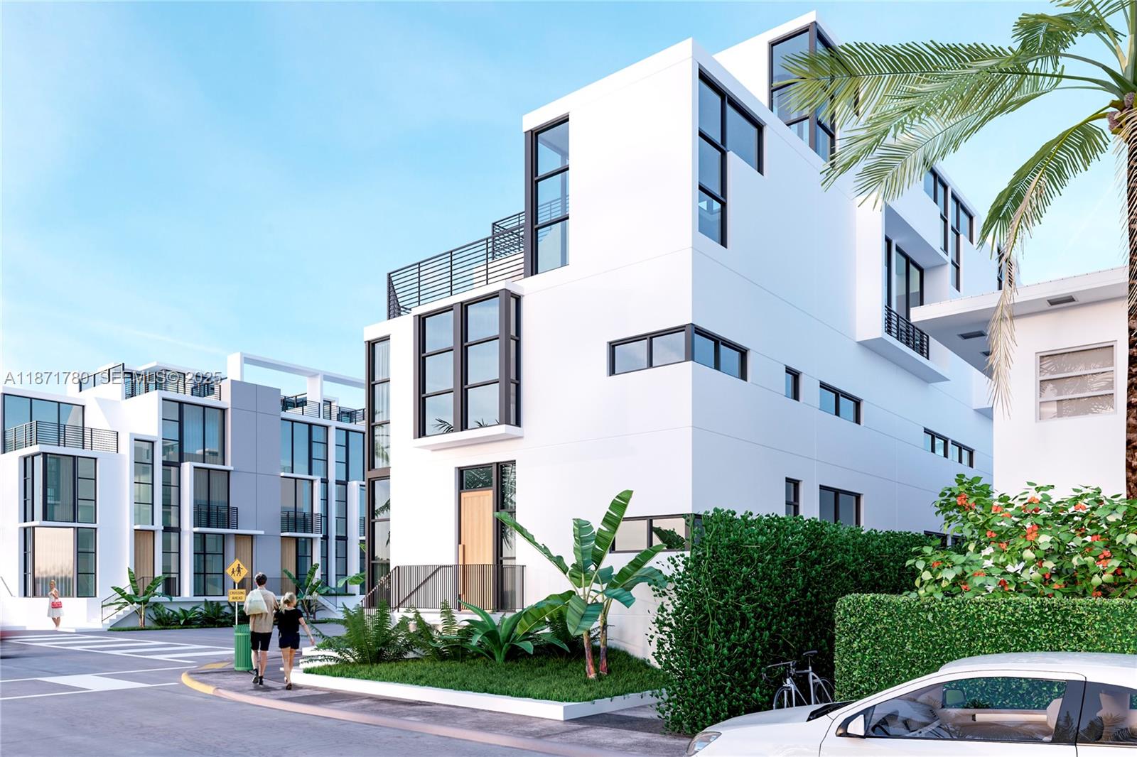 330 76th Street, Unit 5 Miami Beach, FL 33141 - Photo 6 of 8 a front view of a multi story building