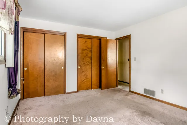 a view of an empty room with window