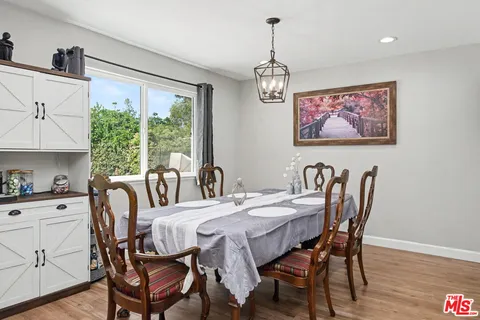 a kitchen with stainless steel appliances a sink stove and refrigerator