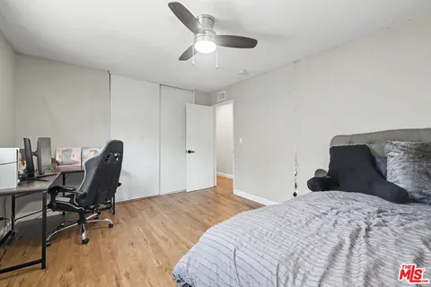 a bathroom with a shower and a toilet
