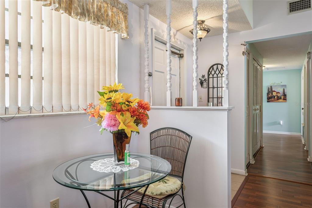 502 Avocado Circle Brandon, FL 33510 - Photo 6 of 50 a view of a dining room with furniture and a potted plant
