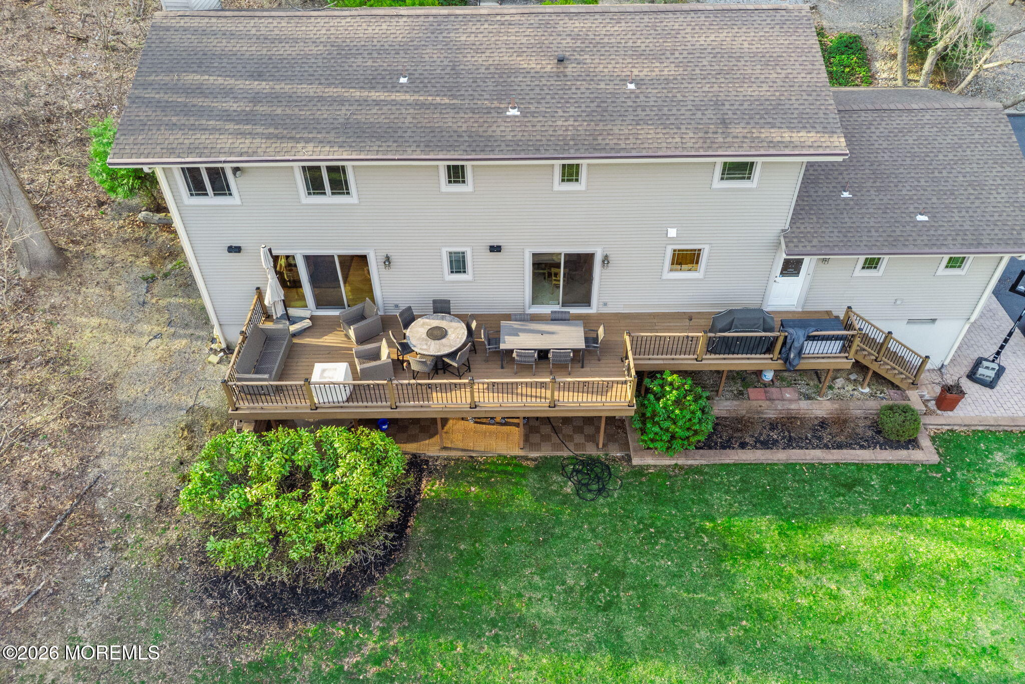 21 Stoney Brook Road Holmdel, NJ 07733 - Photo 35 of 40 an aerial view of a house with garden and sitting area